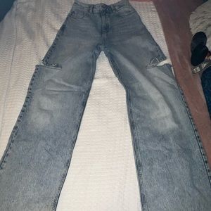 Garage jeans :style wide leg :size 0 waist 24 :holes on sides near knees.